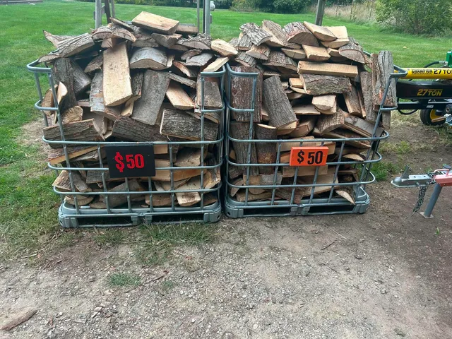 Two wire crates of split hardwood ready for pickup
