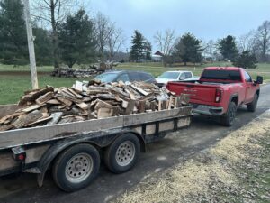 Pickup and trailer loaded with split firewood ready for delivery around Laingsburg